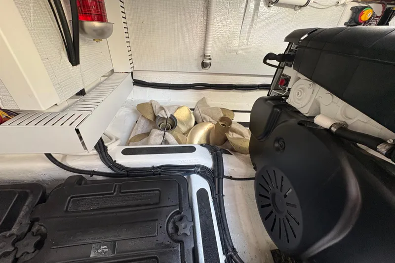  Yacht Photos Pics Engine room of 2023 Sabre 45 Salon Express with propeller and mechanical components.