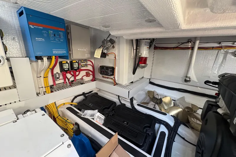  Yacht Photos Pics Engine room of 2023 Sabre 45 Salon Express with electrical components and propellers.