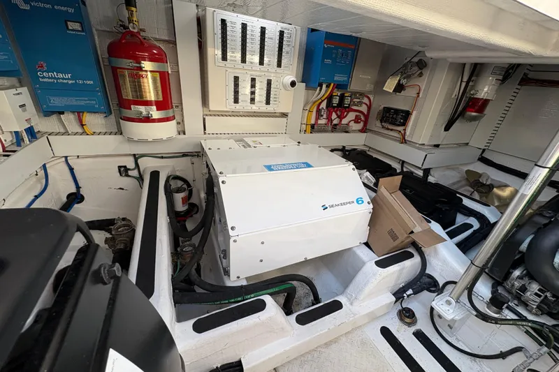  Yacht Photos Pics Engine room of 2023 Sabre 45 Salon Express with Seakeeper 6 stabilizer and electrical systems.
