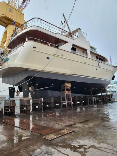 Korab Yacht Photos Pics Custom Motor Yacht Korab 2001 on dry dock, showcasing its elegant design and structure.