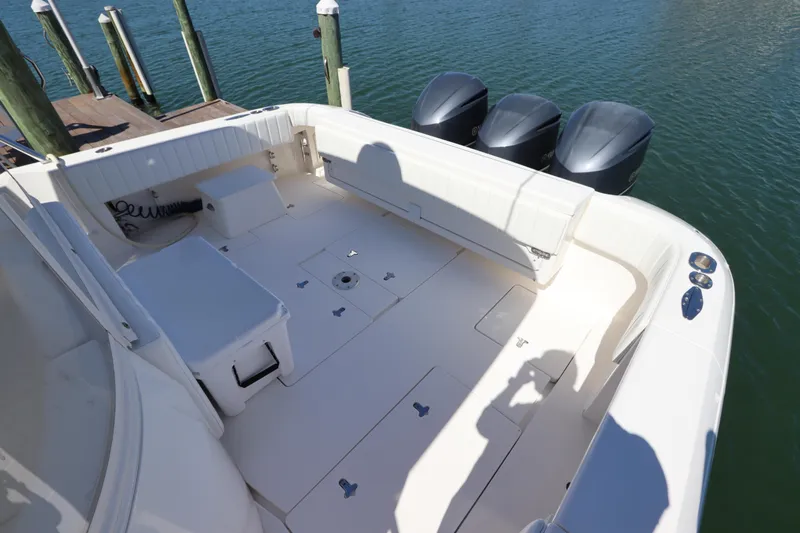 Relentless Yacht Photos Pics 2012 Intrepid 430 Sport Yacht deck with triple outboard engines.