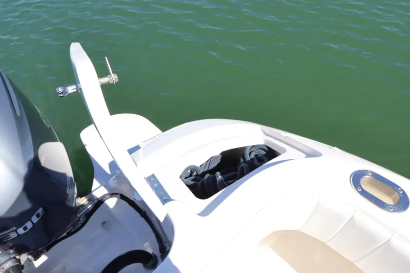 Relentless Yacht Photos Pics 2012 Intrepid 430 Sport Yacht stern with motor and rope storage.