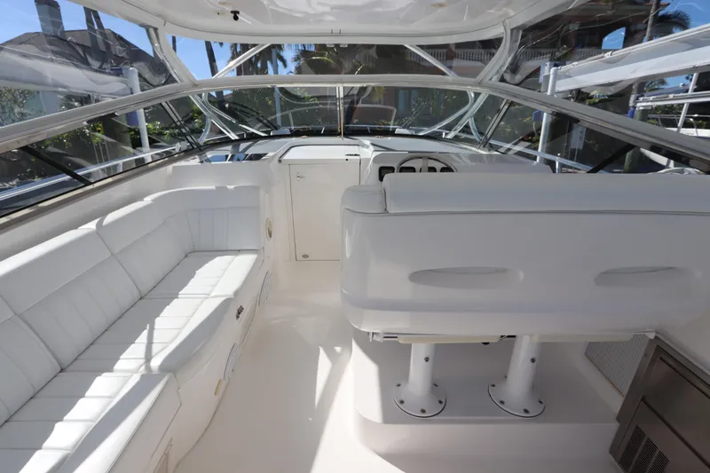 Relentless Yacht Photos Pics 2012 Intrepid 430 Sport Yacht interior with white seating and helm.