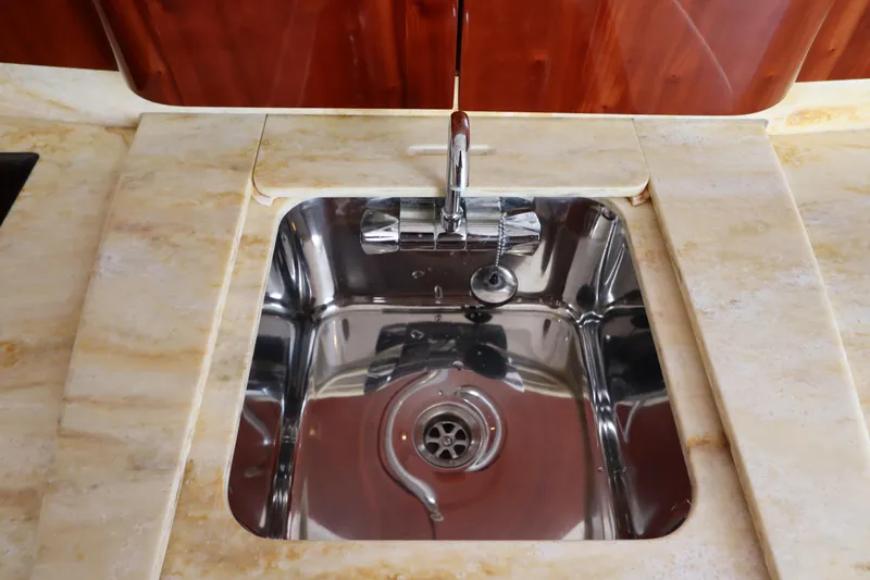 Relentless Yacht Photos Pics Stainless steel sink on 2012 Intrepid 430 Sport Yacht with marble countertop.