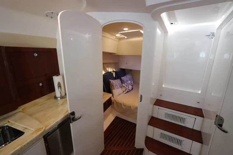 Relentless Yacht Photos Pics Interior of 2012 Intrepid 430 Sport Yacht with cozy cabin and modern amenities.