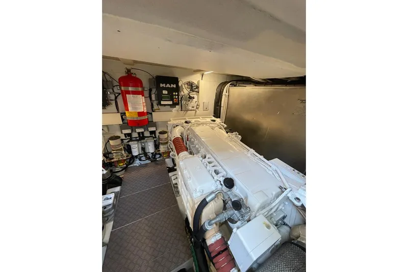  Yacht Photos Pics Engine room of 2017 Ferretti Yachts 550 with MAN engine and safety equipment.