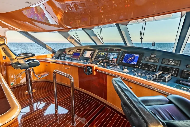 Mystique Yacht Photos Pics Luxurious 2001 Feadship Custom yacht bridge with advanced navigation systems and ocean view.