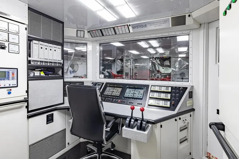 Mystique Yacht Photos Pics Control room of 2001 Feadship Custom yacht, featuring advanced navigation and monitoring systems.