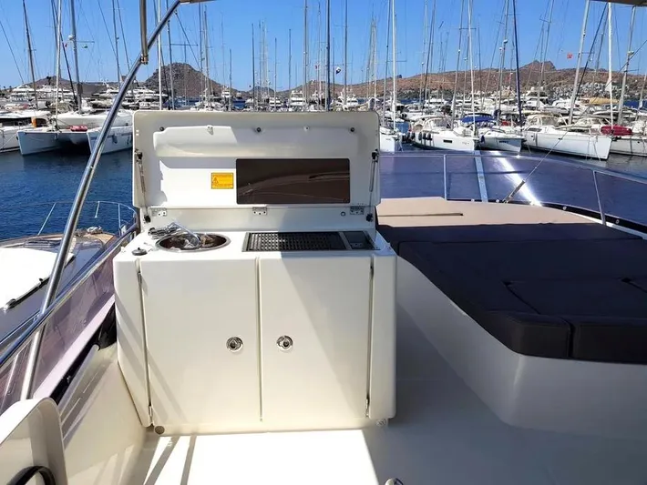  Yacht Photos Pics Prestige 500 yacht deck with outdoor kitchen, marina view, 2013 model.