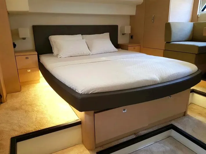  Yacht Photos Pics Luxurious bedroom interior of 2013 Prestige 500 yacht with modern design and cozy lighting.