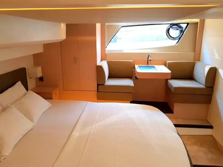  Yacht Photos Pics Luxurious cabin interior of a 2013 Prestige 500 yacht with modern furnishings.