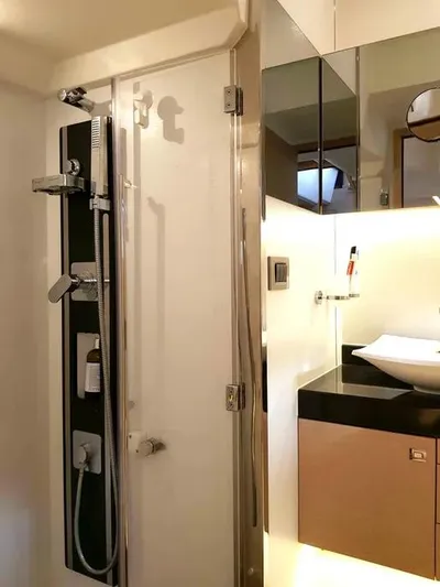  Yacht Photos Pics Modern bathroom in 2013 Prestige 500 yacht with sleek shower and elegant sink area.