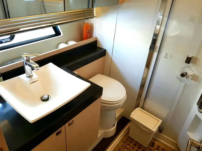  Yacht Photos Pics Luxurious bathroom in 2013 Prestige 500 yacht with modern sink and toilet.