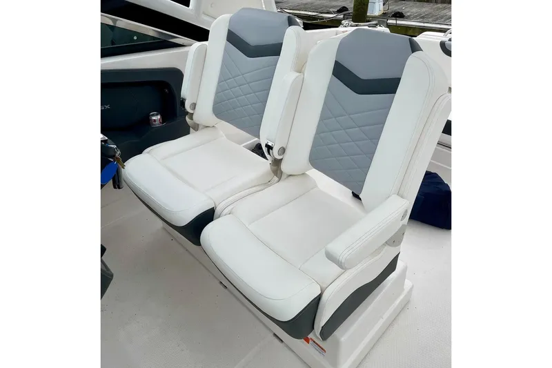 Seaventure Yacht Photos Pics 2023 Chaparral 280 OSX boat interior with dual white and gray seats.