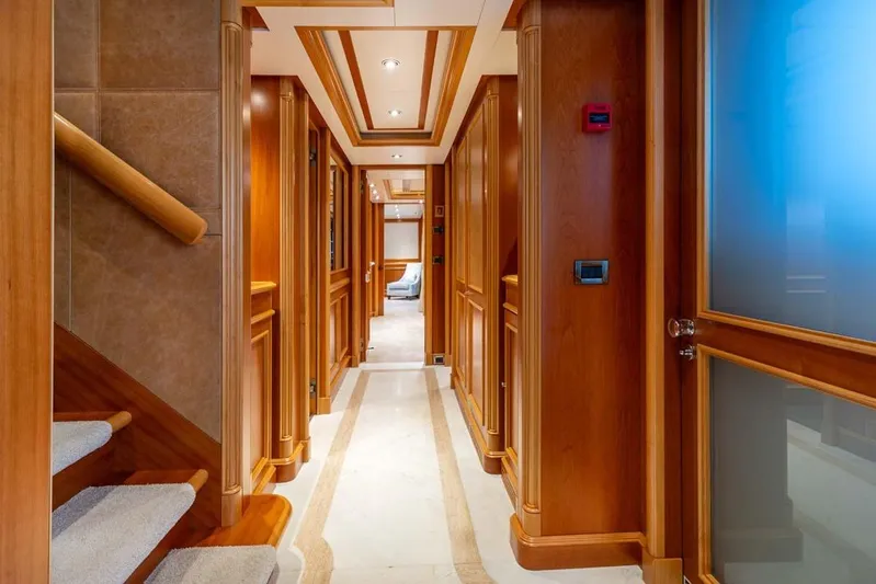 Emotion 2 Yacht Photos Pics Luxurious wooden interior hallway of a 2007 CRN Motor Yacht, featuring elegant design elements.