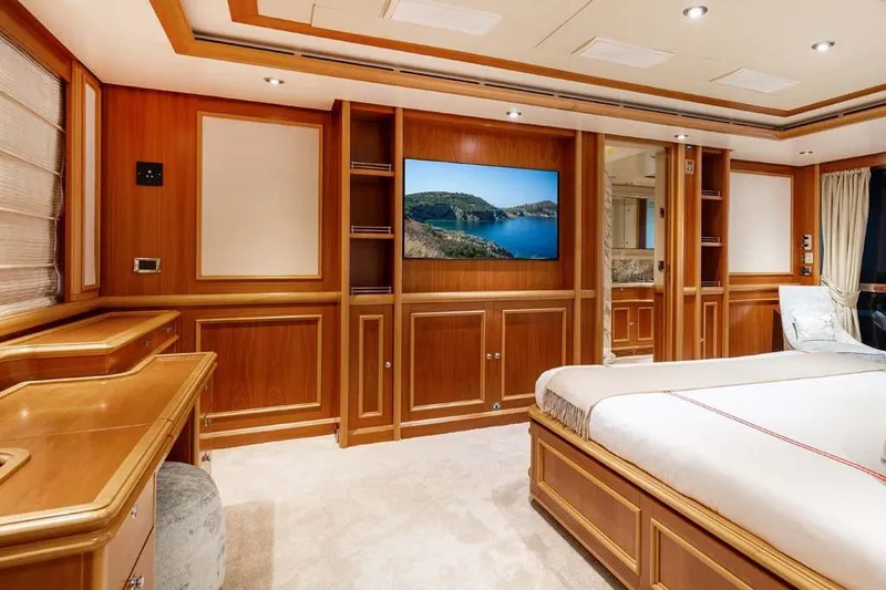 Emotion 2 Yacht Photos Pics Luxurious 2007 CRN Motor Yacht bedroom with elegant wood paneling and modern amenities.