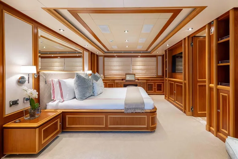 Emotion 2 Yacht Photos Pics Luxurious 2007 CRN Motor Yacht bedroom with elegant wood paneling and modern decor.