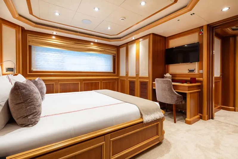 Emotion 2 Yacht Photos Pics Luxurious 2007 CRN Motor Yacht bedroom with elegant wood paneling and modern amenities.