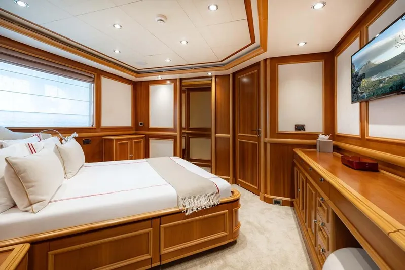 Emotion 2 Yacht Photos Pics Luxurious 2007 CRN Motor Yacht bedroom with elegant wood paneling and modern amenities.