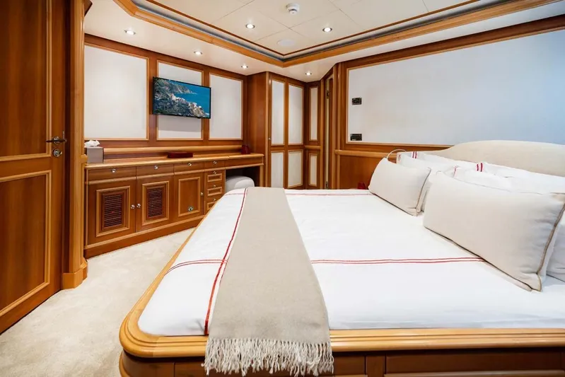 Emotion 2 Yacht Photos Pics Luxurious 2007 CRN Motor Yacht bedroom with elegant wood paneling and modern amenities.