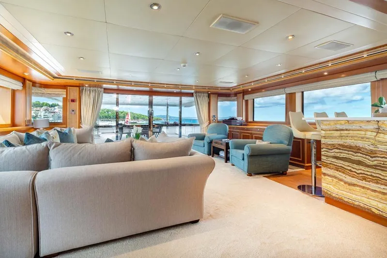 Emotion 2 Yacht Photos Pics Luxurious interior of 2007 CRN Motor Yacht with elegant seating and ocean view.
