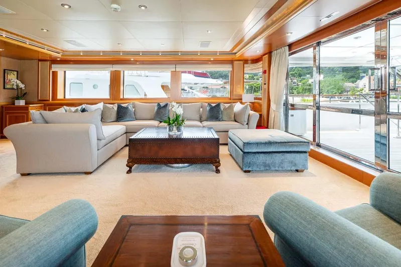 Emotion 2 Yacht Photos Pics Luxurious interior of 2007 CRN Motor Yacht with elegant seating and large windows.