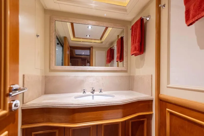 Emotion 2 Yacht Photos Pics Luxurious bathroom interior on 2007 CRN Motor Yacht with elegant wood and marble finishes.