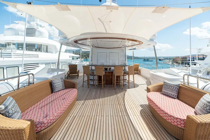 Emotion 2 Yacht Photos Pics Luxurious 2007 CRN Motor Yacht deck with elegant seating and ocean view.