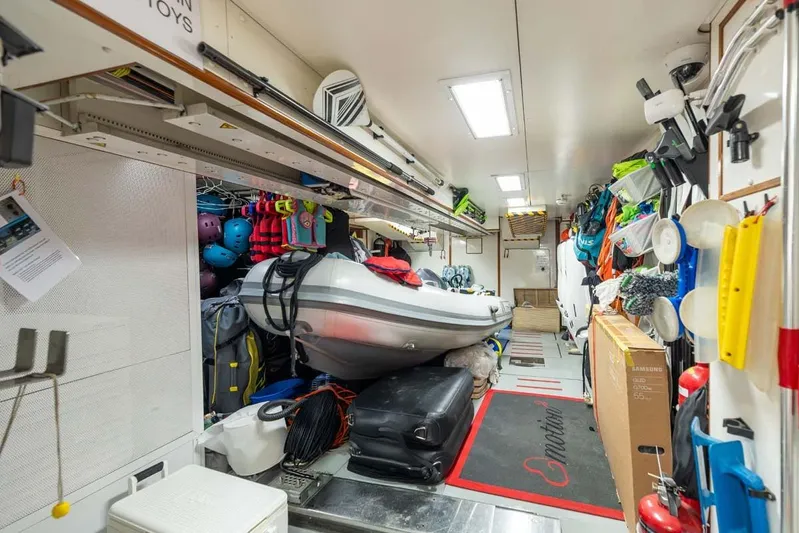 Emotion 2 Yacht Photos Pics Storage area of 2007 CRN Motor Yacht with inflatable boat and equipment.