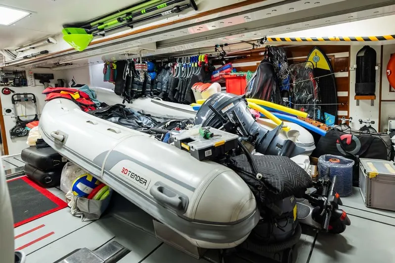 Emotion 2 Yacht Photos Pics Storage area of a 2007 CRN Motor Yacht with inflatable boat and water sports gear.