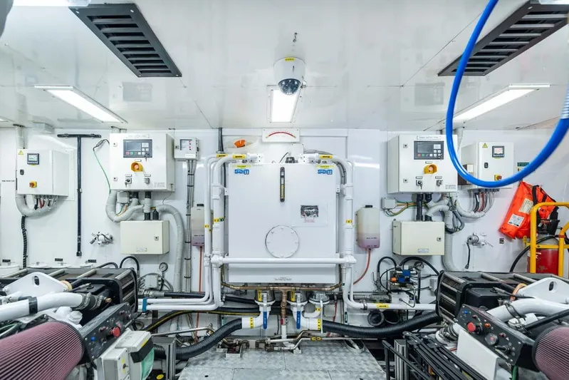 Emotion 2 Yacht Photos Pics Engine room of 2007 CRN Motor Yacht with control panels and machinery.