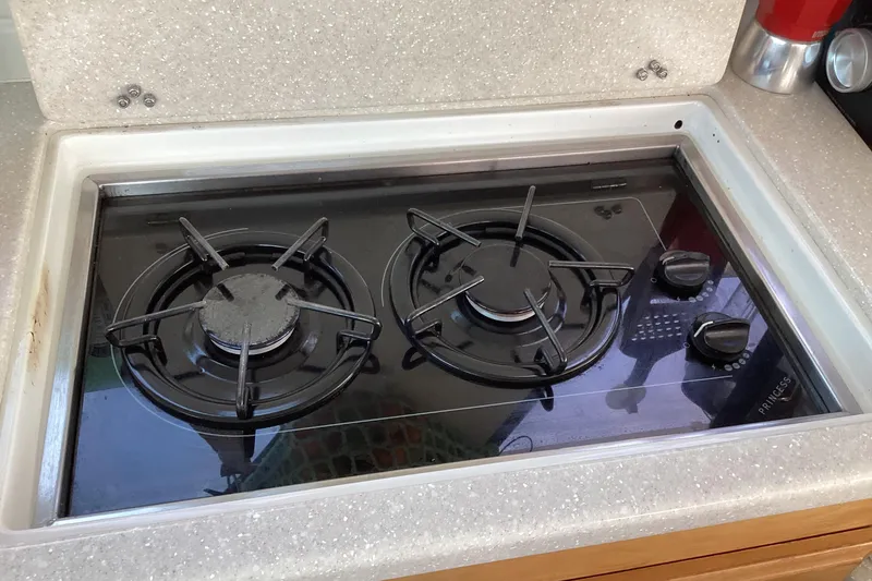 Ha Kin Yacht Photos Pics Gas stove with two burners on a 2008 Back Cove 33 boat.