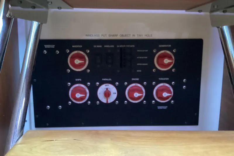 Ha Kin Yacht Photos Pics Electrical control panel on a 2008 Back Cove 33 boat, featuring multiple switches and dials.