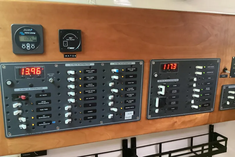Ha Kin Yacht Photos Pics Electrical control panel on a 2008 Back Cove 33 boat, displaying voltage readings.
