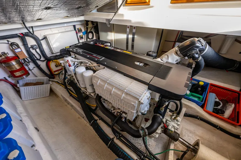 Ha Kin Yacht Photos Pics Engine room of a 2008 Back Cove 33 boat, featuring a well-maintained engine.