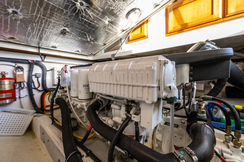 Ha Kin Yacht Photos Pics Engine room of 2008 Back Cove 33 boat, featuring Volvo Penta components and fire safety equipment.