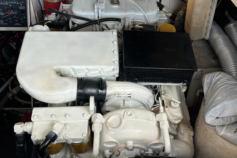  Yacht Photos Pics Engine compartment of a 2000 Tiara Yachts 3700 Open, showcasing mechanical components.