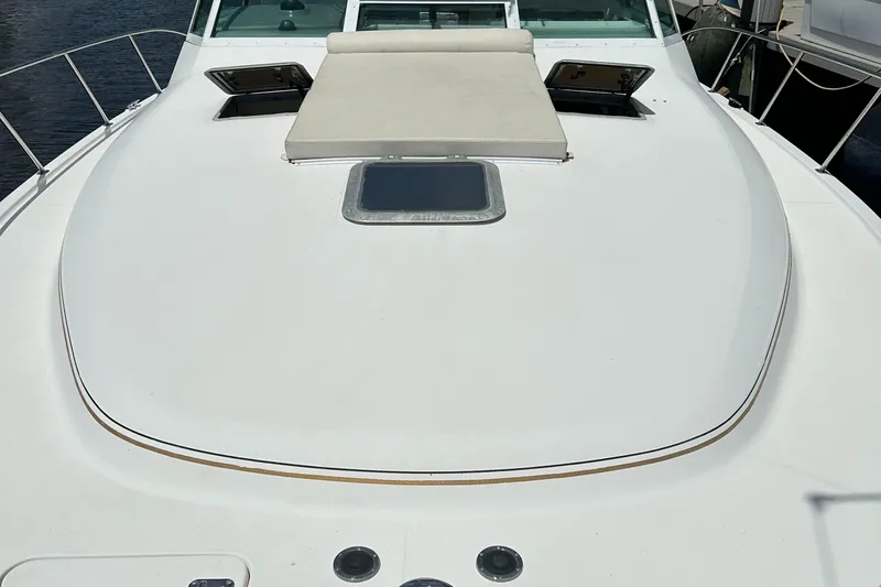  Yacht Photos Pics 2000 Tiara Yachts 3700 Open deck with sunpad and hatches.