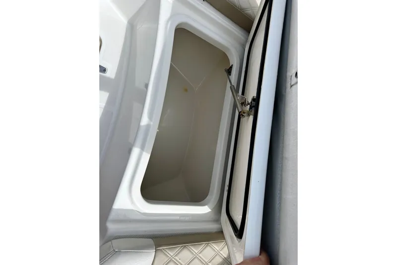Bottoms Up Yacht Photos Pics Open storage compartment on a 2019 Boston Whaler 330 Outrage boat.