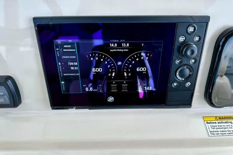Bottoms Up Yacht Photos Pics Dashboard display of a 2019 Boston Whaler 330 Outrage showing engine metrics and controls.