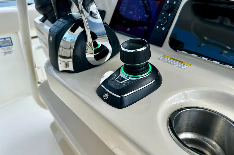 Bottoms Up Yacht Photos Pics Control panel of 2019 Boston Whaler 330 Outrage boat with joystick and throttle.