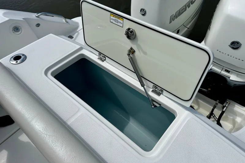 Bottoms Up Yacht Photos Pics Open storage compartment on a 2019 Boston Whaler 330 Outrage boat.