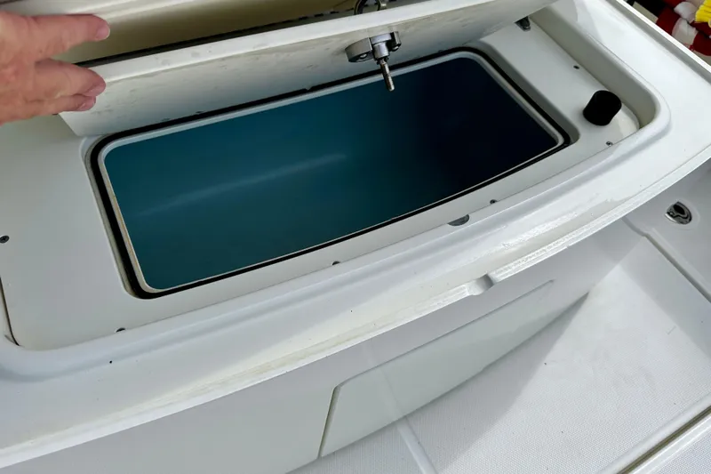 Bottoms Up Yacht Photos Pics Open storage compartment on a 2019 Boston Whaler 330 Outrage boat.