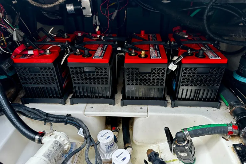 Bottoms Up Yacht Photos Pics Batteries in a 2019 Boston Whaler 330 Outrage boat engine compartment.