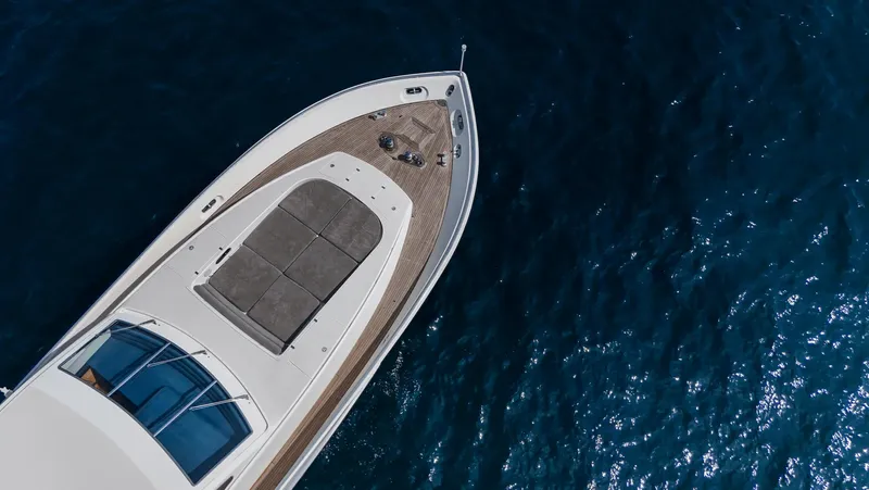  Yacht Photos Pics Aerial view of 1999 Leopard 27 yacht on deep blue water.