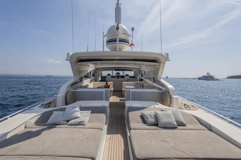  Yacht Photos Pics Luxurious 1999 Leopard 27 yacht with spacious sunbathing deck on open sea.
