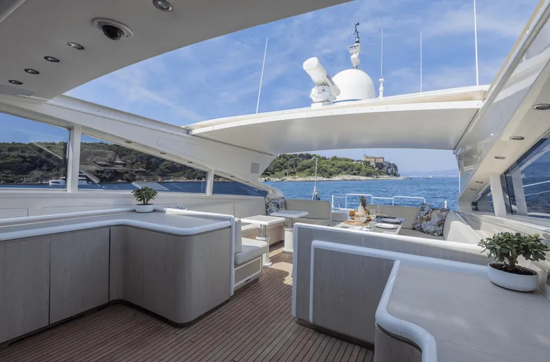  Yacht Photos Pics Luxurious Leopard 27 yacht interior with elegant seating, ocean view, and modern design, built in 1999.