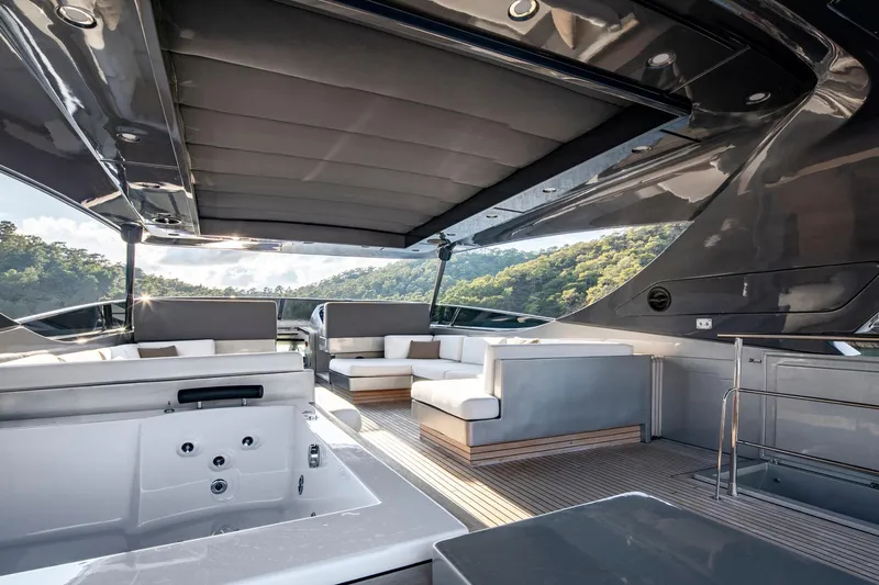  Yacht Photos Pics Luxurious 2009 Canados 110 yacht interior with modern seating and scenic views.