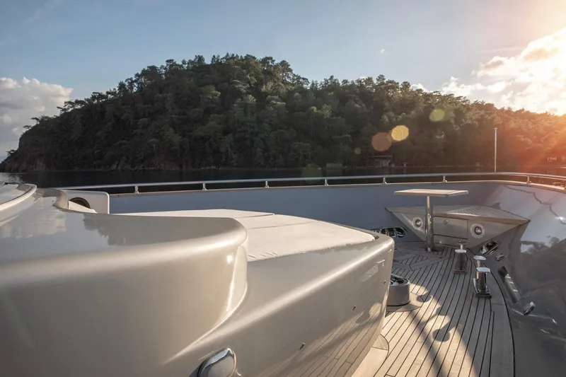  Yacht Photos Pics Luxury Canados 110 yacht deck with scenic island view, 2009 model, sunlit and serene.