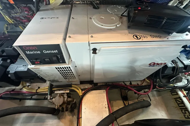 Sassy II Yacht Photos Pics Onan Marine Genset in 2008 Cruisers Yachts 415 Express Motoryacht engine room.